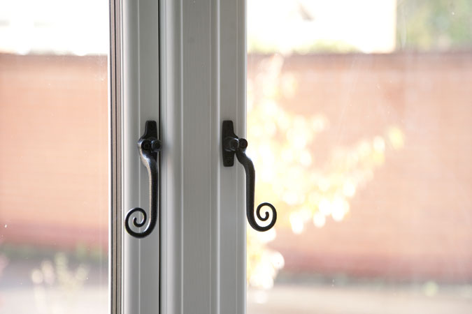 Classic monkey tail handles on Residence 9 window
